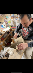 shaping silver earrings with mallet and punch 